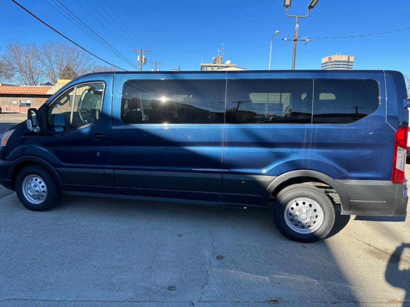 2022 BLUE /Charcoal Gray Ford Transit (1FBAX9Y8XNK) with an 3.5 engine, Automatic transmission, located at 3200 1st Avenue North, Billings, MT, 59101, (406) 245-9055, 45.779270, -108.510742 - This is One of Our 15 Passenger Vans Available for Sale or Rent. Dual Power Seats, Tilt Steering, Cruise Control, Front & Rear Air Conditioning, Power Windows, Power Door Locks, Privacy Glass, Extended Fuel Capacity, Tow Package, All Wheel Drive and Much More! CarFax Dealer Auto Brokers of Monta - Photo #4